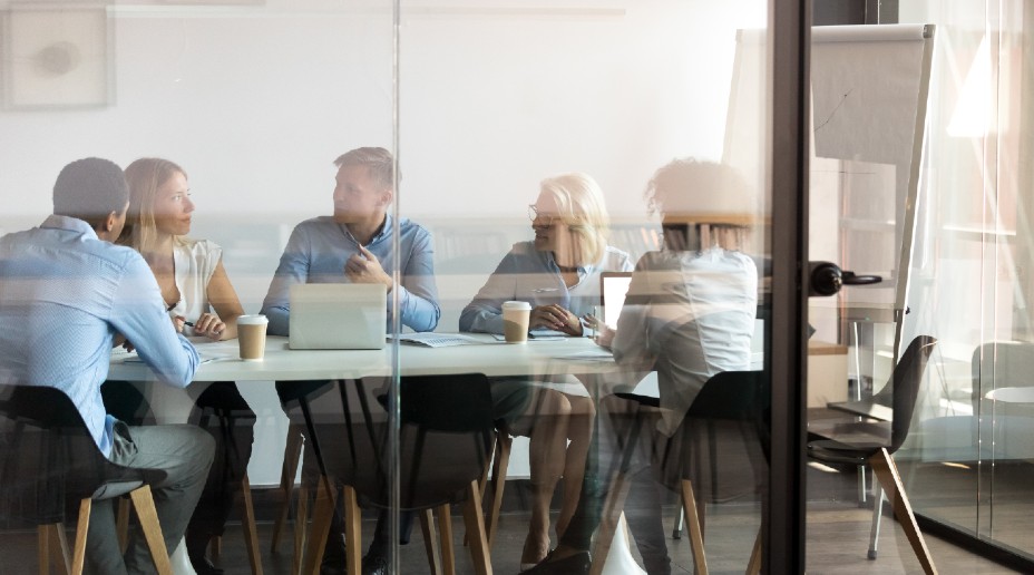 A young man with a large backpack on.