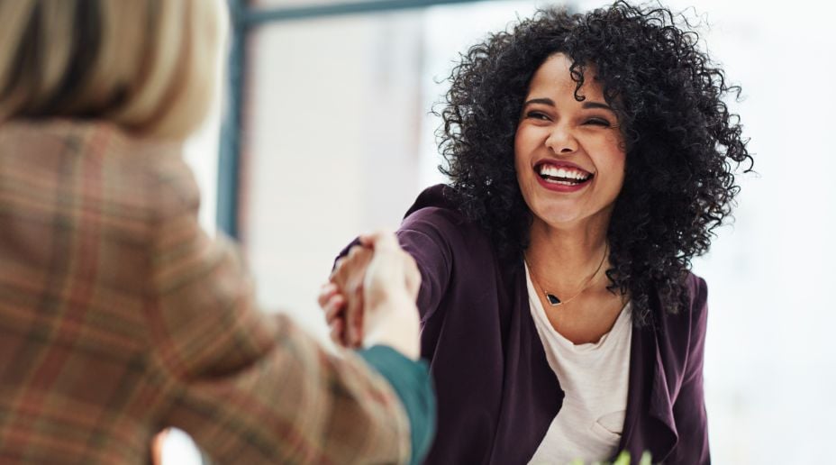 business women shaking hands