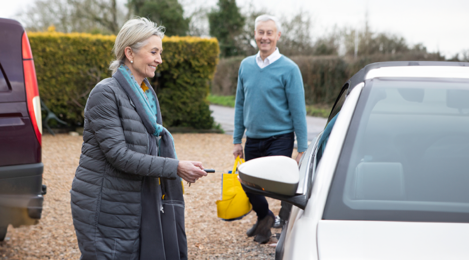 Couple at their car