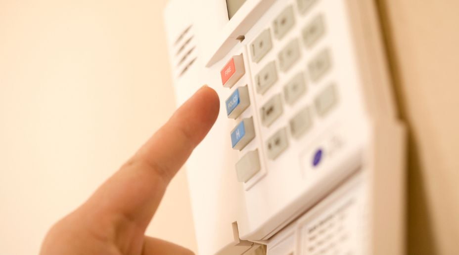 A young man with a large backpack on.