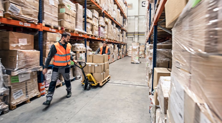 A worker in a warehouse