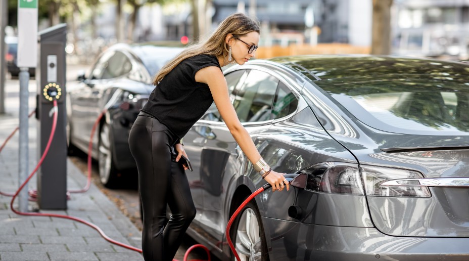 Woman charging car